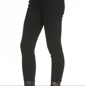 Black embellished lace hem mid-rise skinny jeans